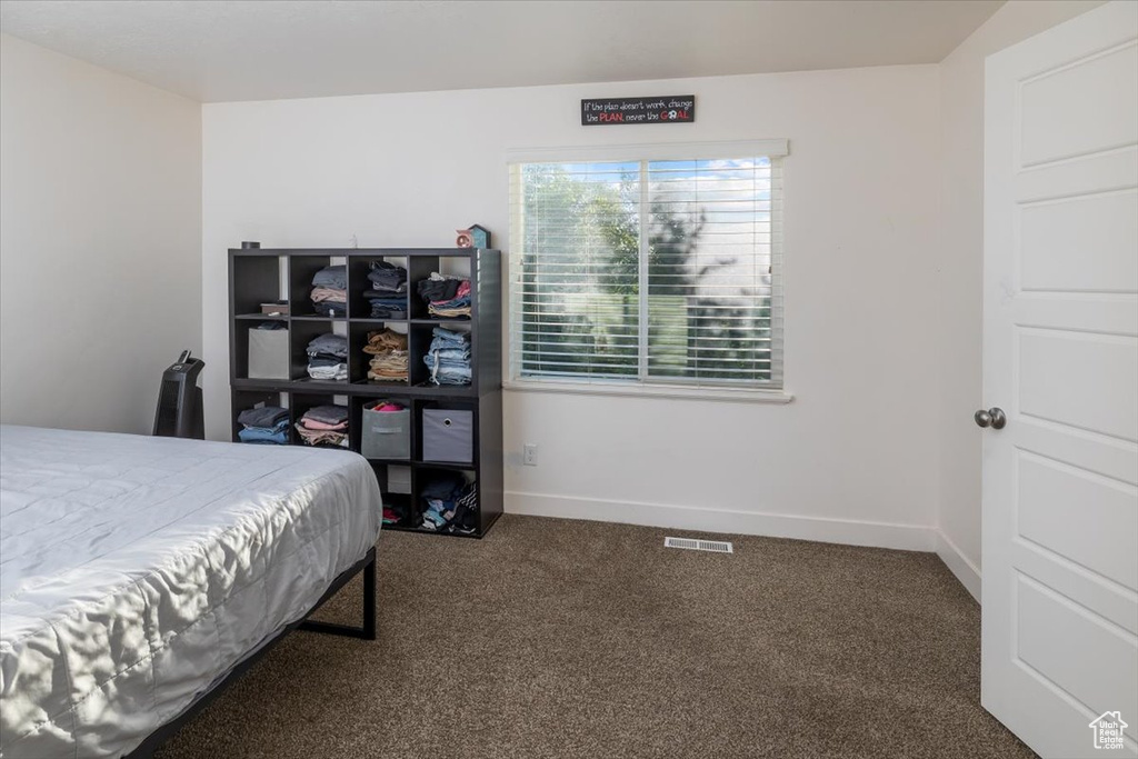 Bedroom featuring carpet flooring