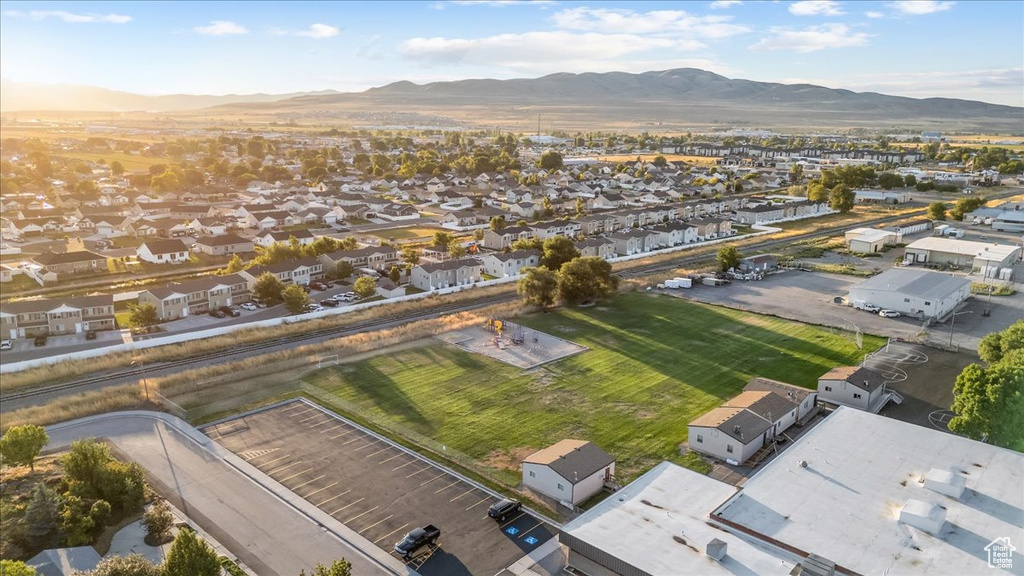 Birds eye view of property with a mountain view