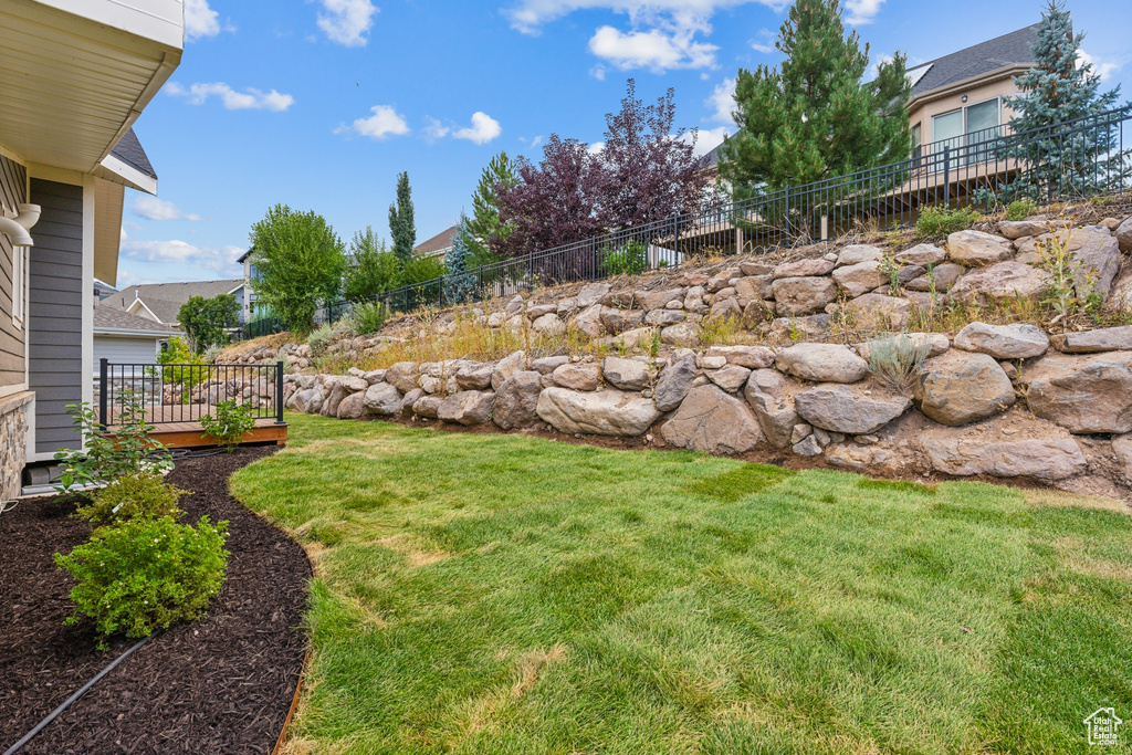 View of yard featuring a deck