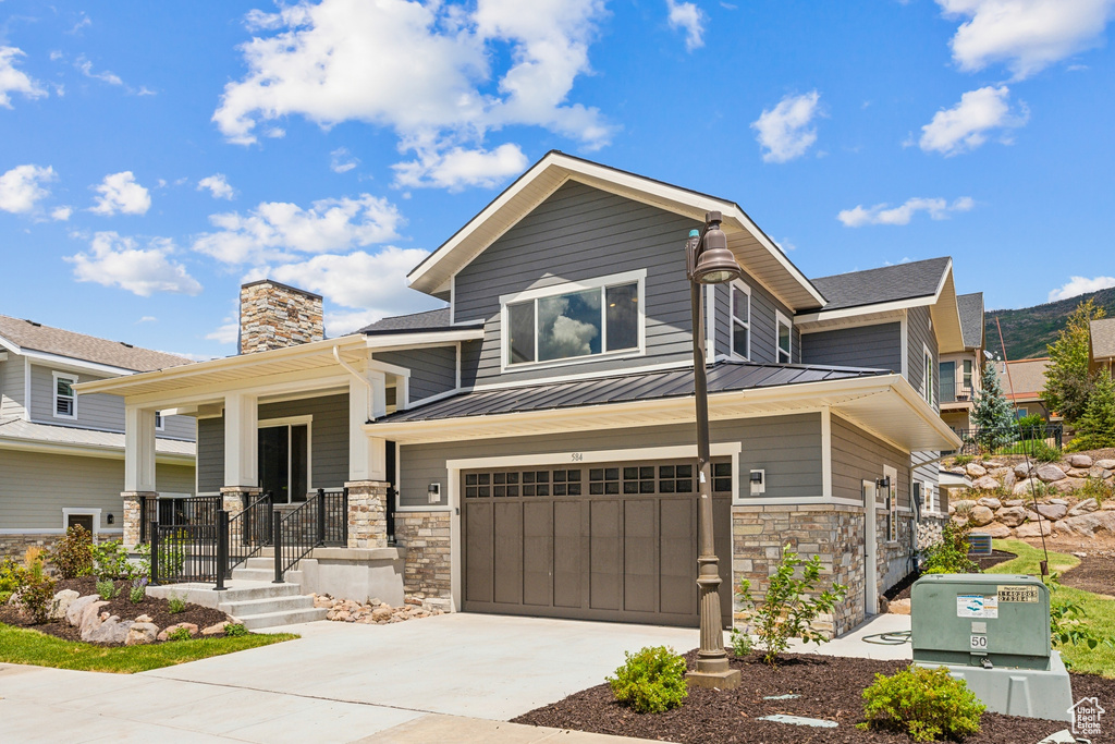 View of front of property with a garage