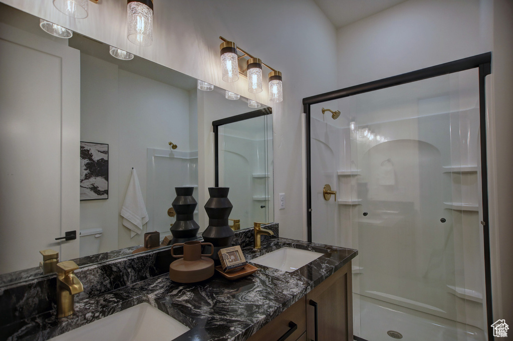 Bathroom with dual vanity and walk in shower