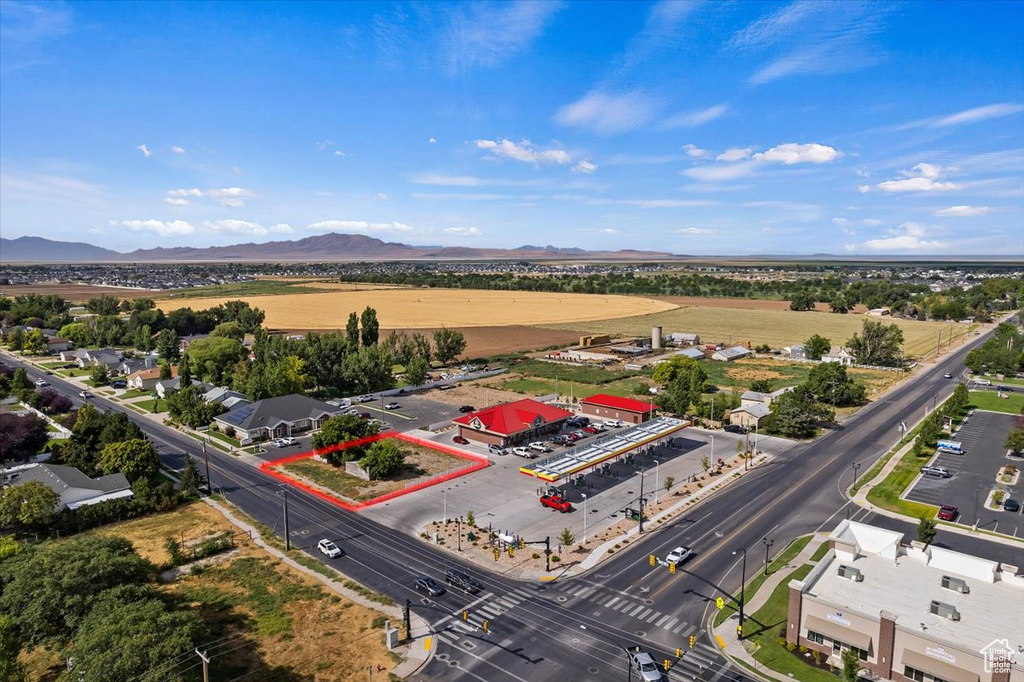 Birds eye view of property featuring a mountain view