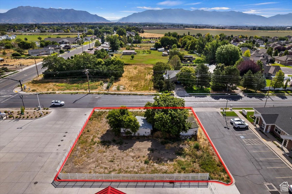 Drone / aerial view featuring a mountain view