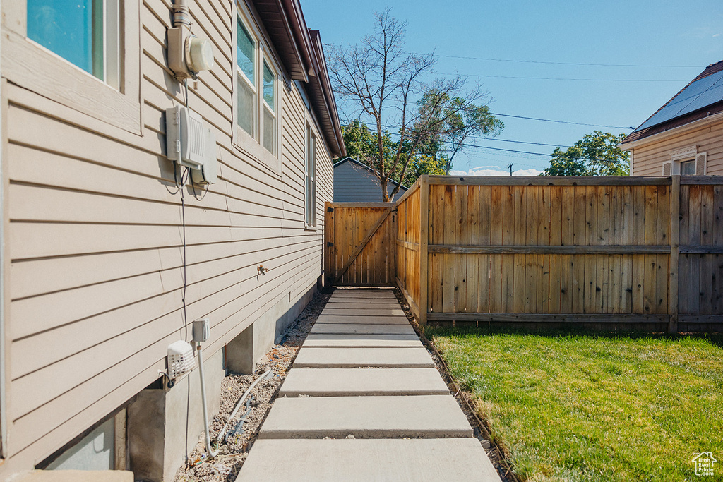 Exterior space featuring a yard