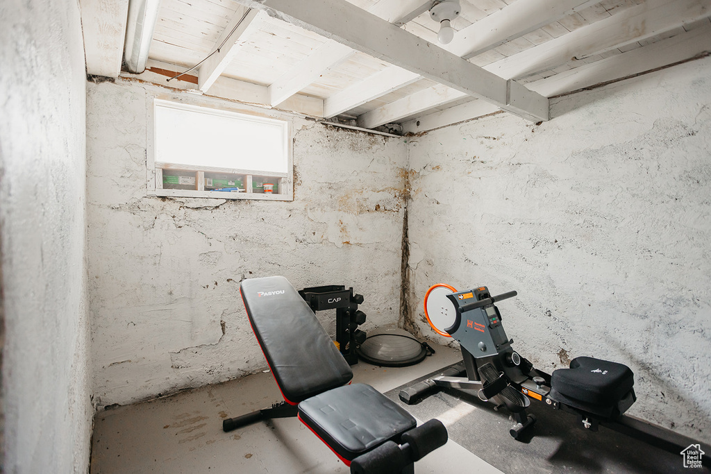 Exercise room featuring concrete flooring