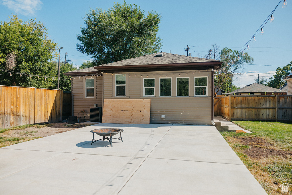 Rear view of house featuring a patio