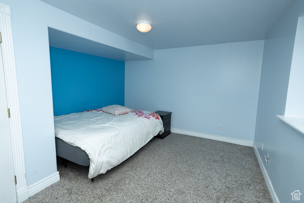 View of carpeted bedroom