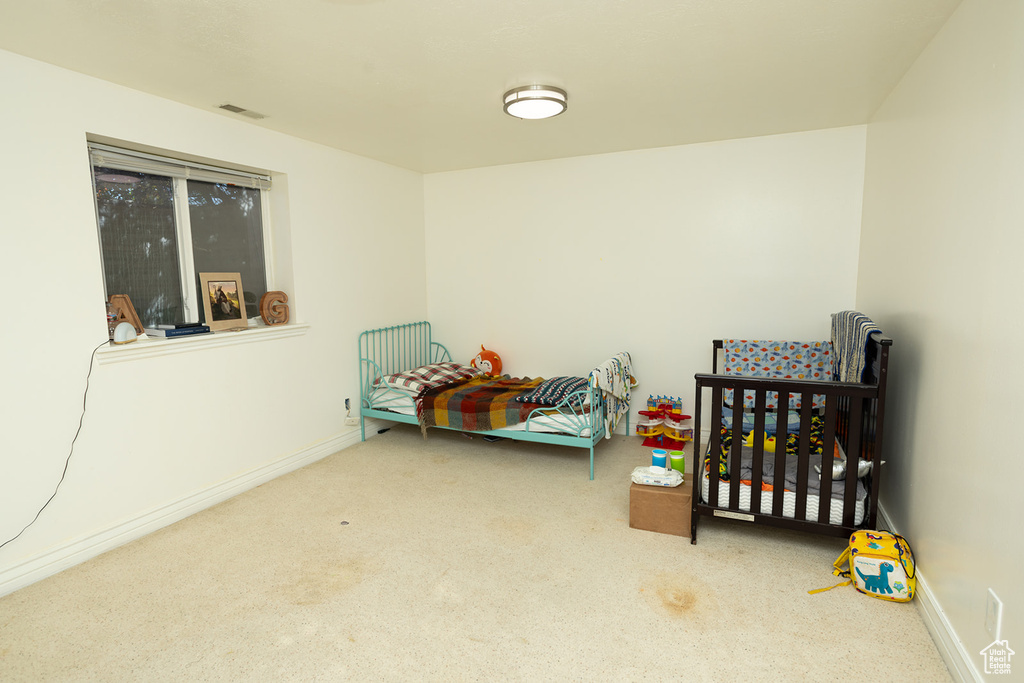 Bedroom featuring carpet flooring