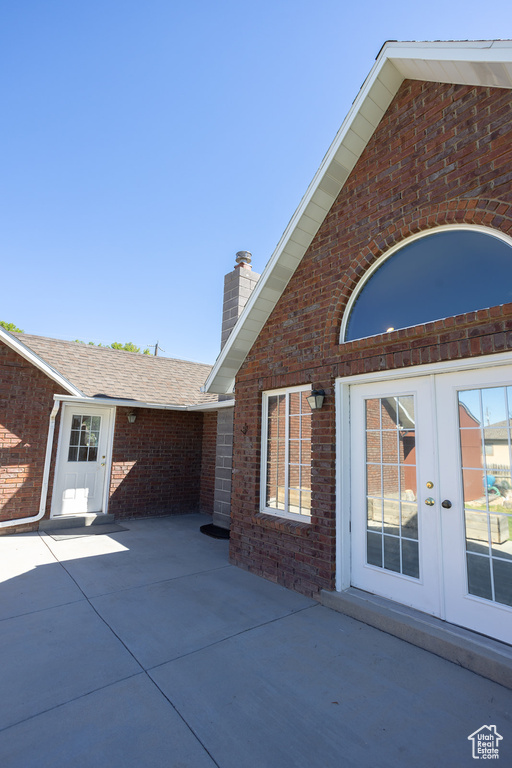 View of patio featuring french doors