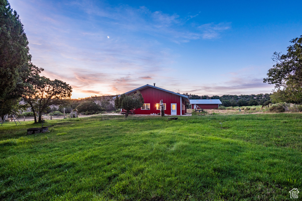 View of yard at dusk