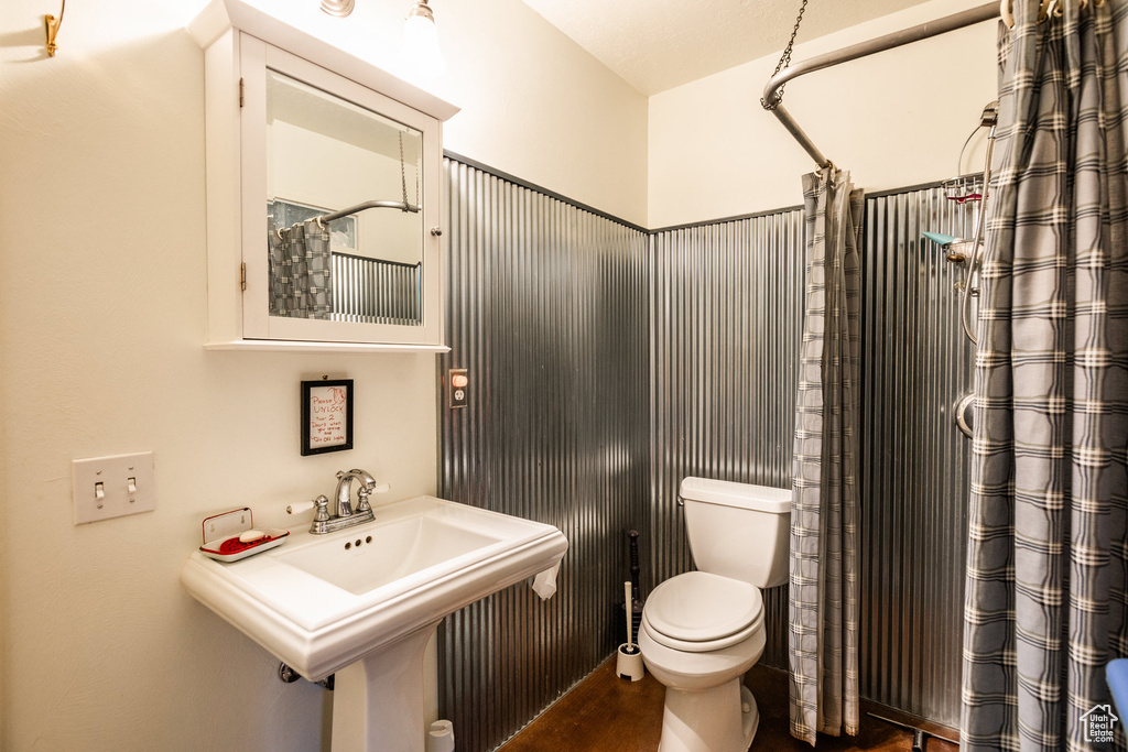 Bathroom with sink and toilet