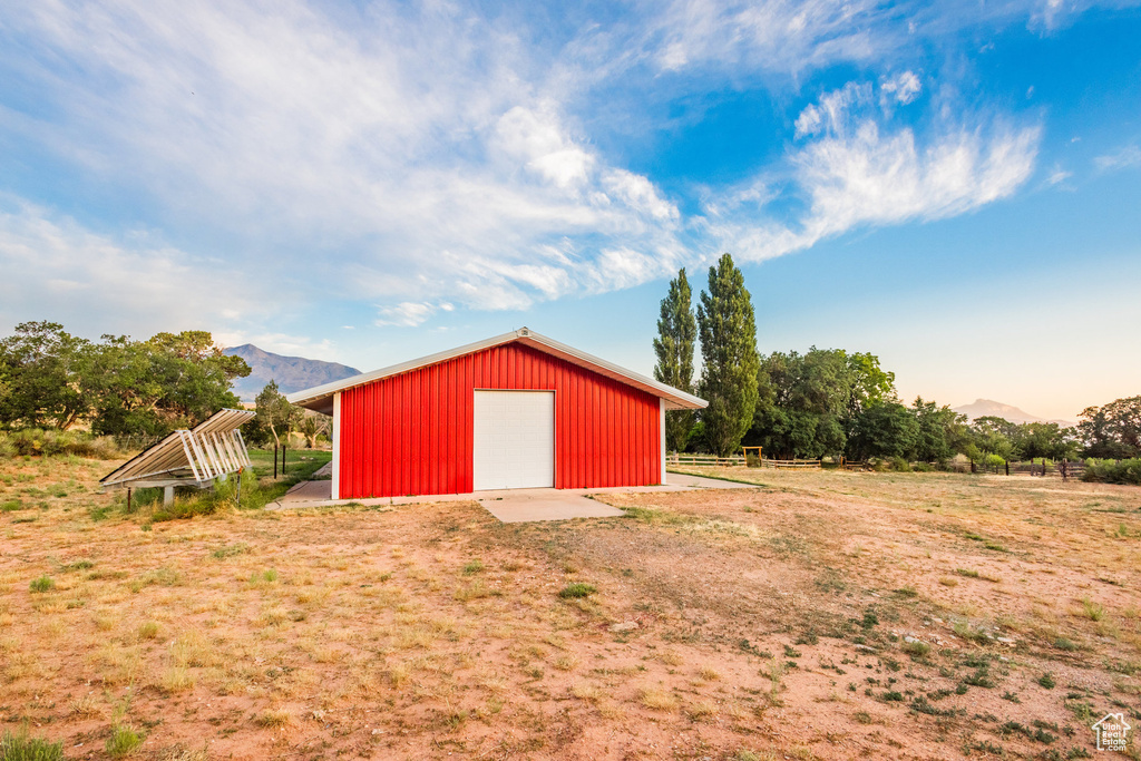 View of outdoor structure with a garage