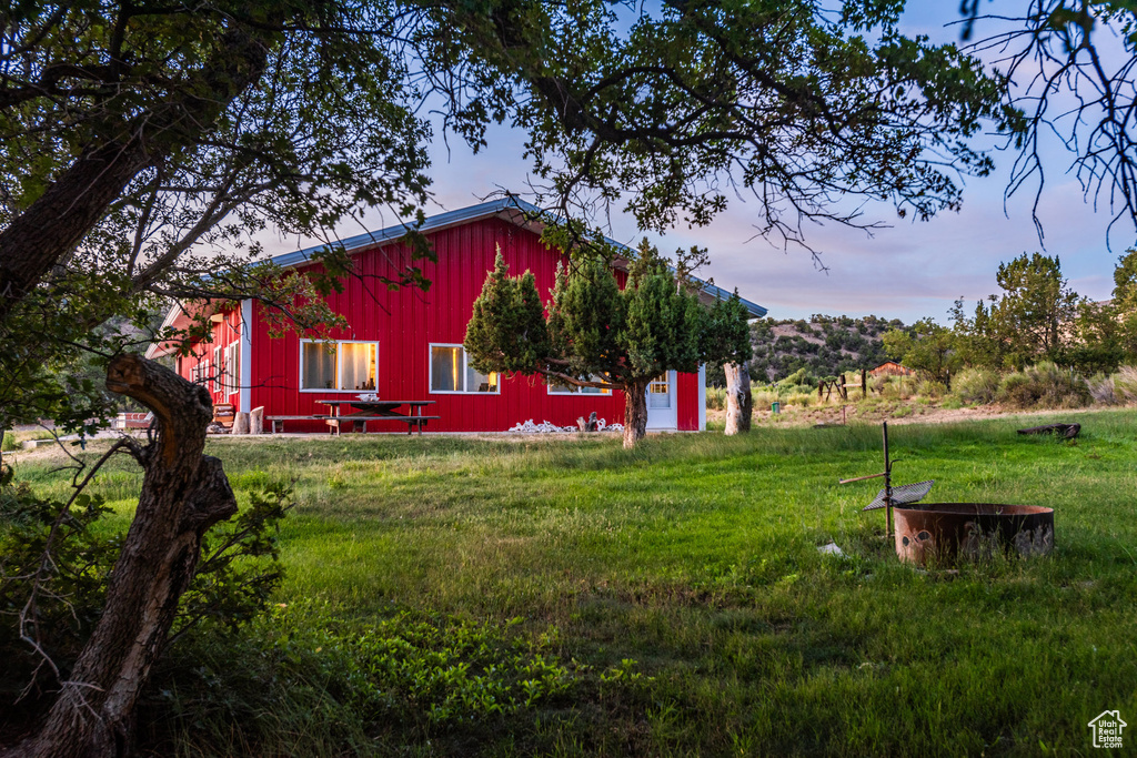 View of yard at dusk