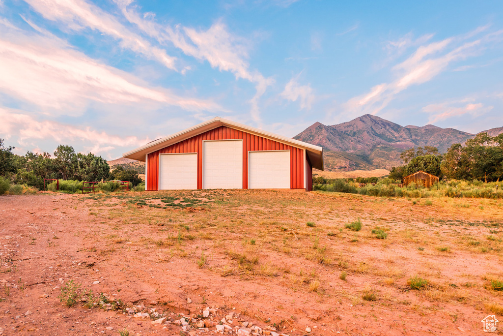 Garage featuring a mountain view