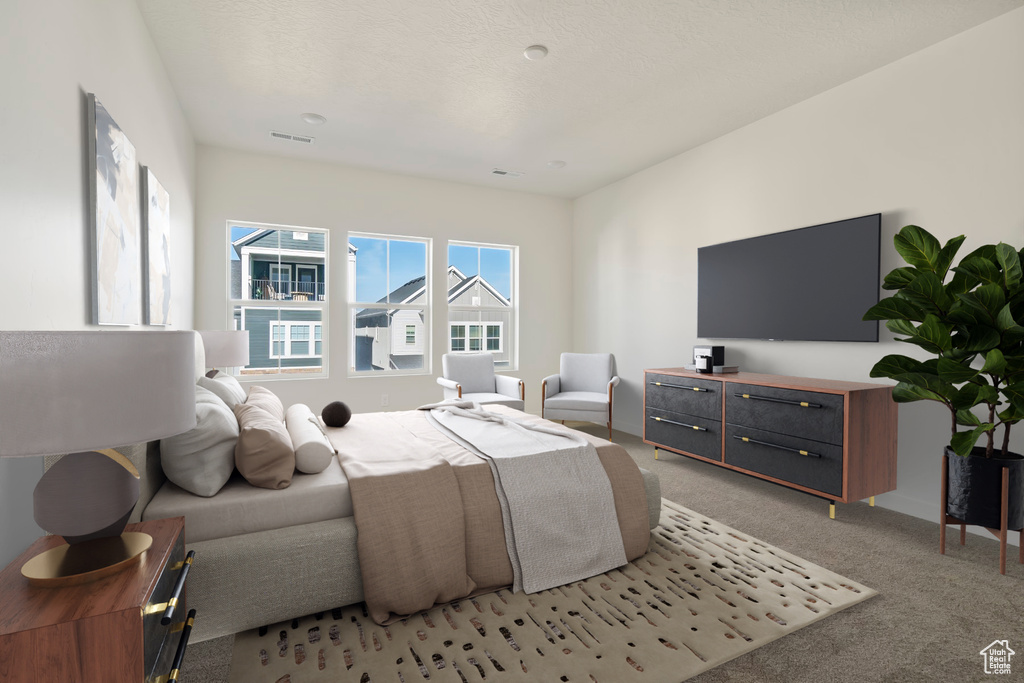 View of carpeted bedroom
