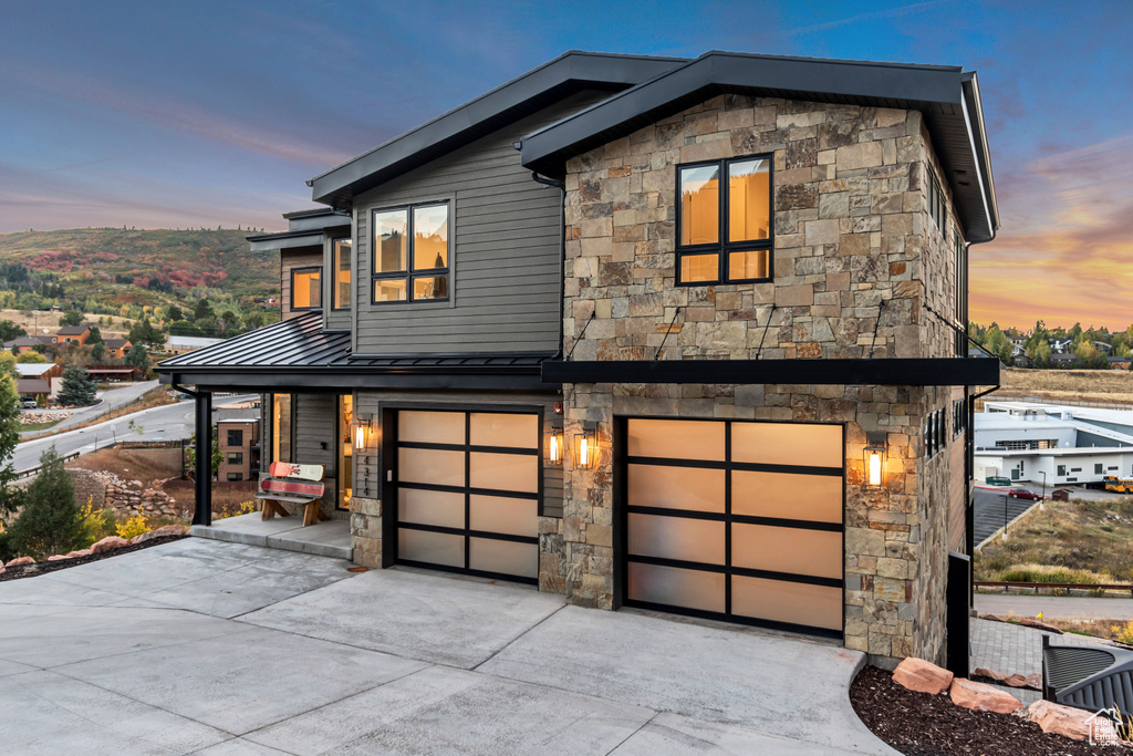 Contemporary house featuring a garage