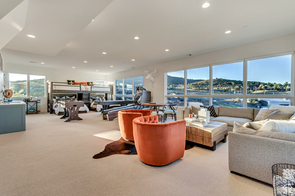 Living room featuring light colored carpet