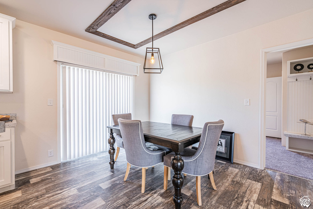 Dining space featuring dark hardwood / wood-style floors