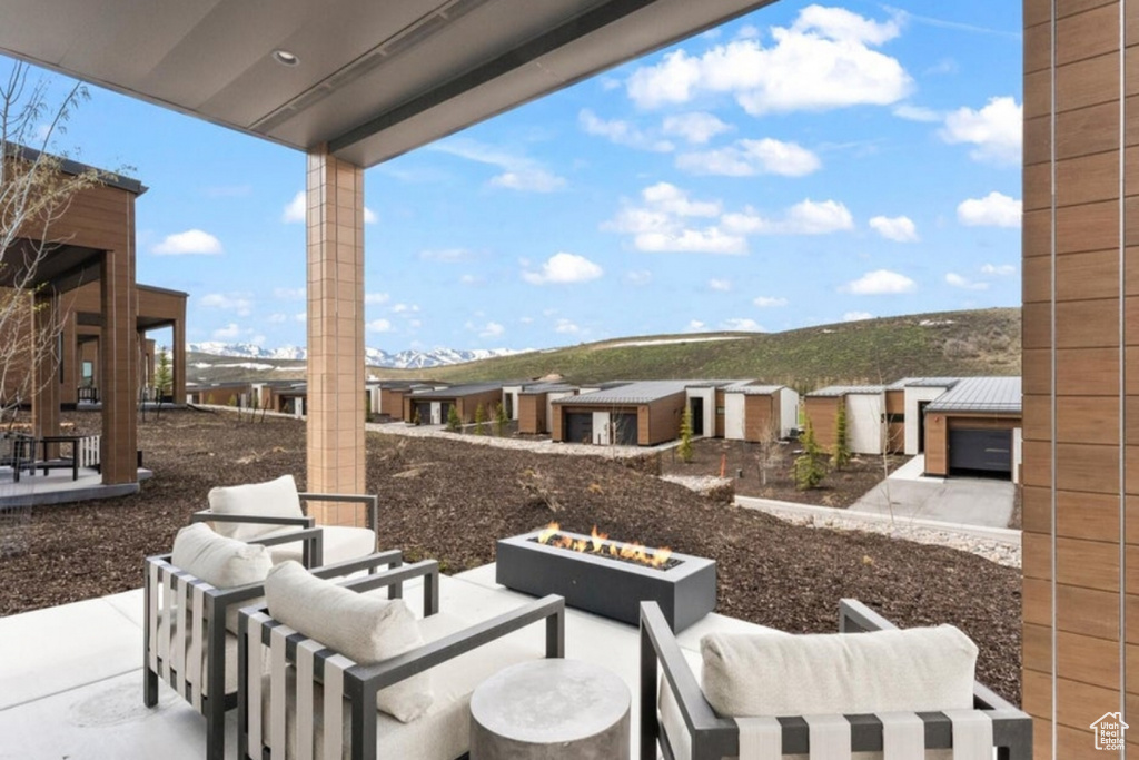 View of patio with an outdoor living space