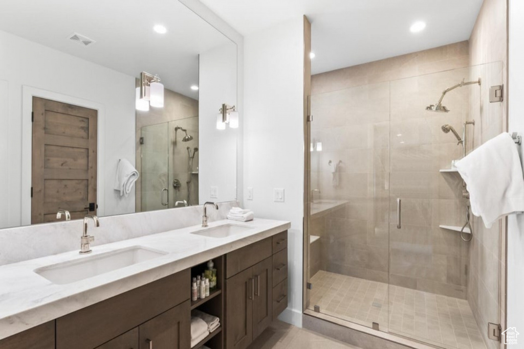 Bathroom with dual vanity and walk in shower