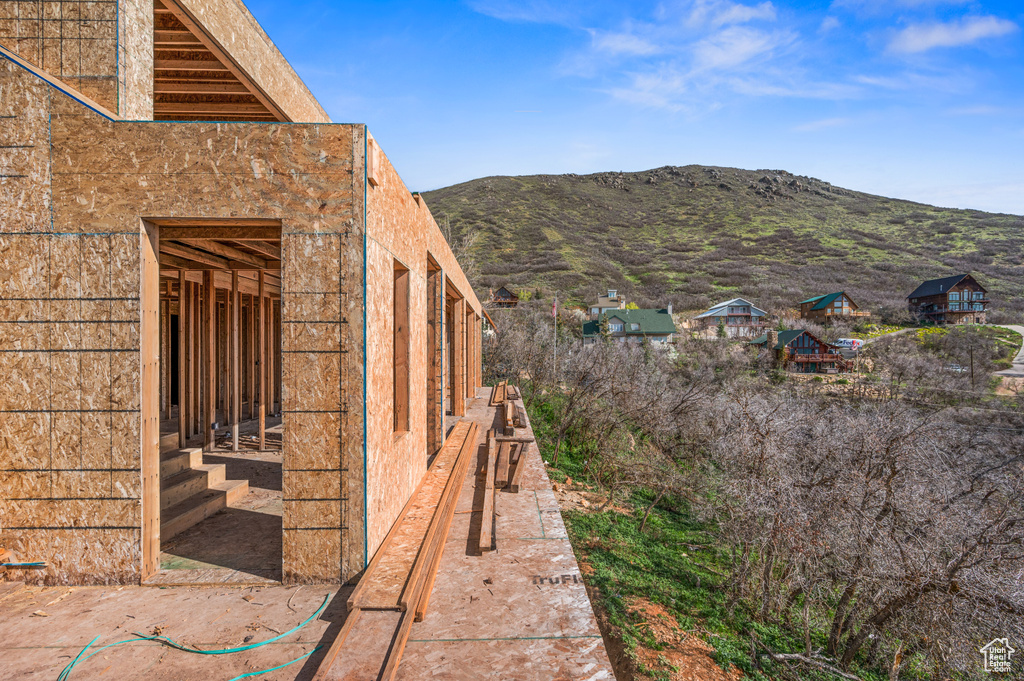 Exterior space featuring a mountain view