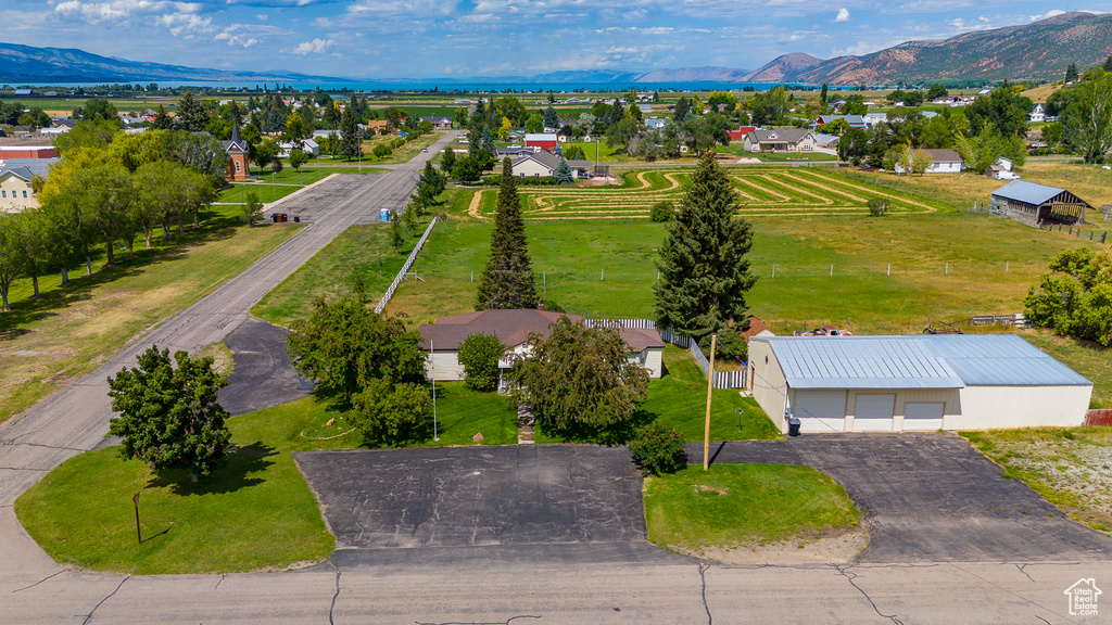 Birds eye view of property with a mountain view