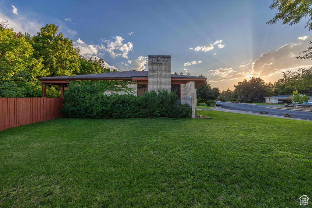 Exterior space featuring a lawn