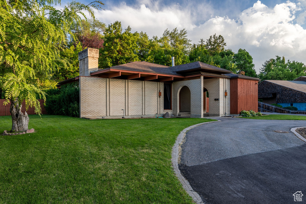 View of front of home with a front lawn