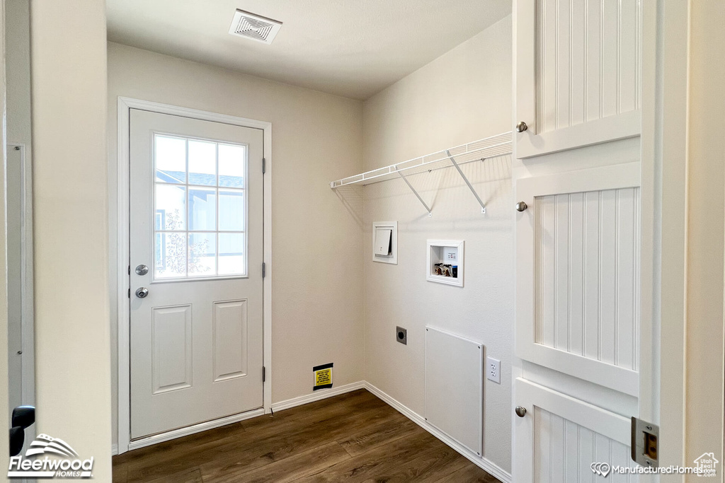 Laundry area featuring hookup for an electric dryer, hookup for a washing machine, and dark wood-type flooring