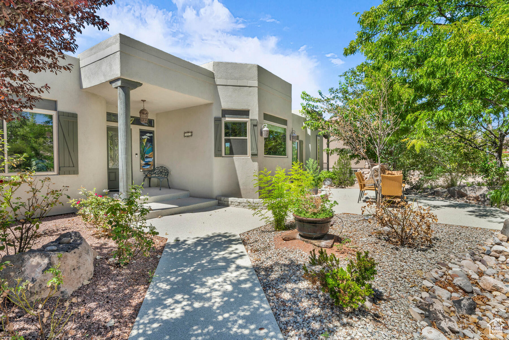 View of front of house with a patio area