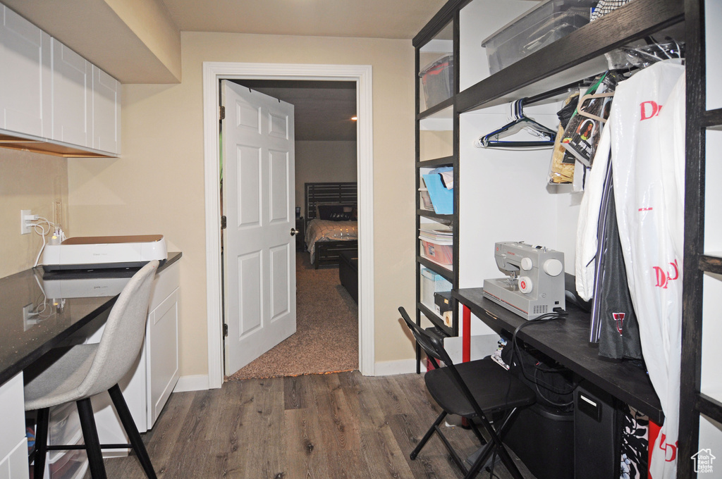 Interior space featuring dark wood-type flooring