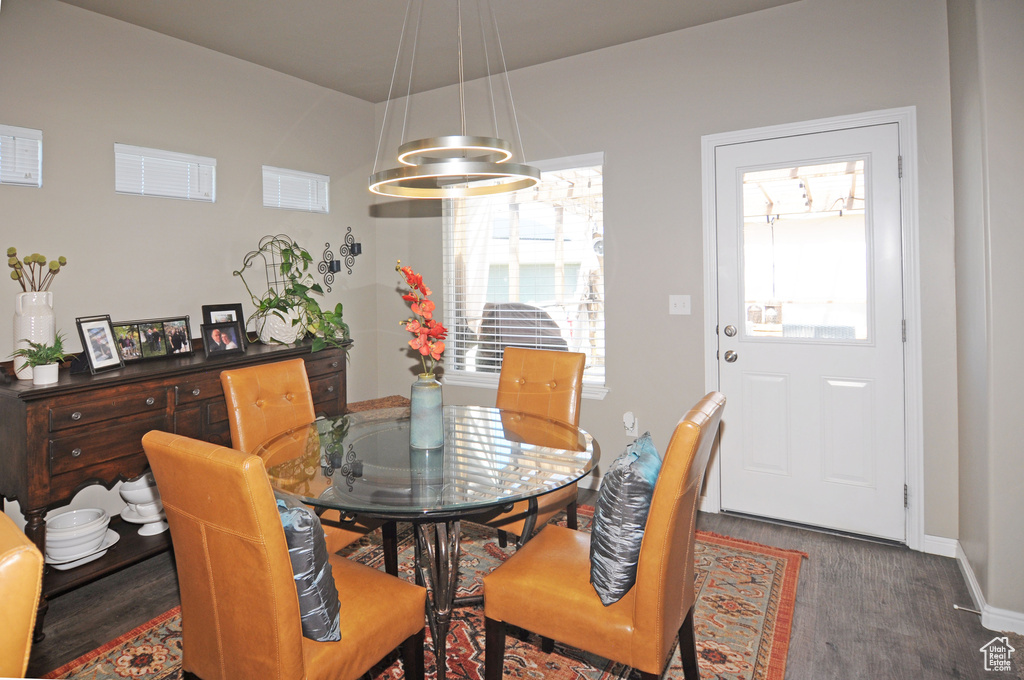 Dining room featuring a wealth of natural light and hardwood / wood-style floors