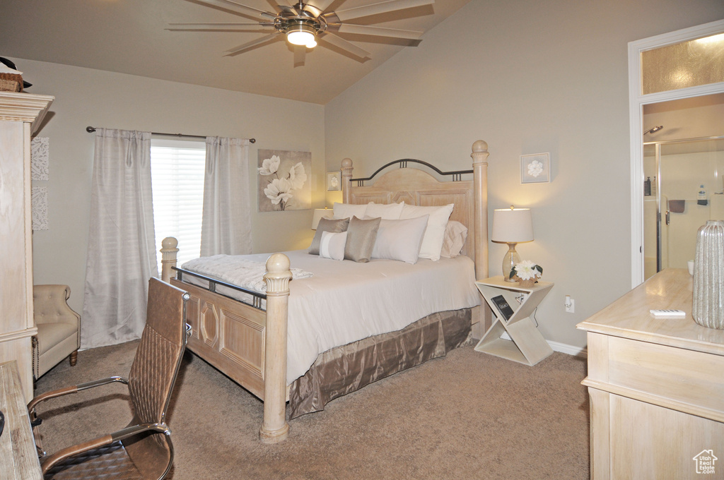 Bedroom with ceiling fan, lofted ceiling, and carpet