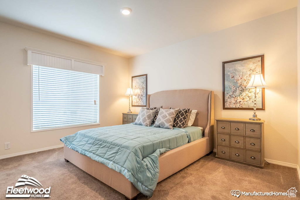 Bedroom featuring carpet flooring