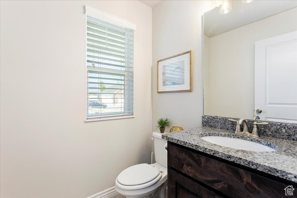 Bathroom with toilet and vanity