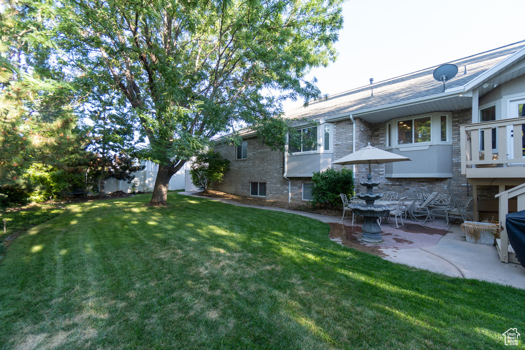 View of yard featuring a patio area