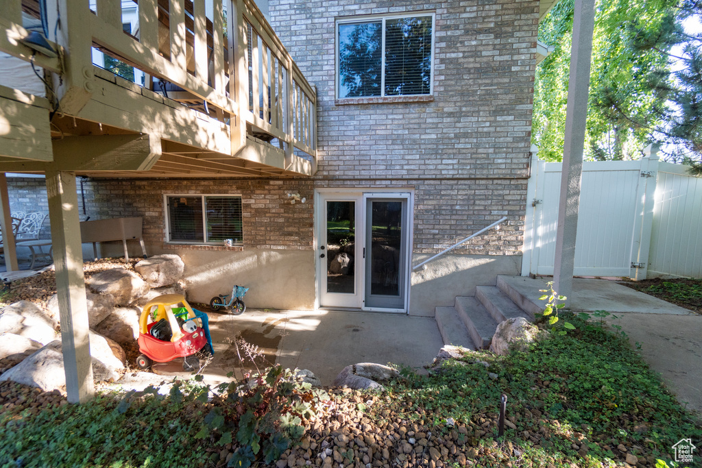 Rear view of property with a patio