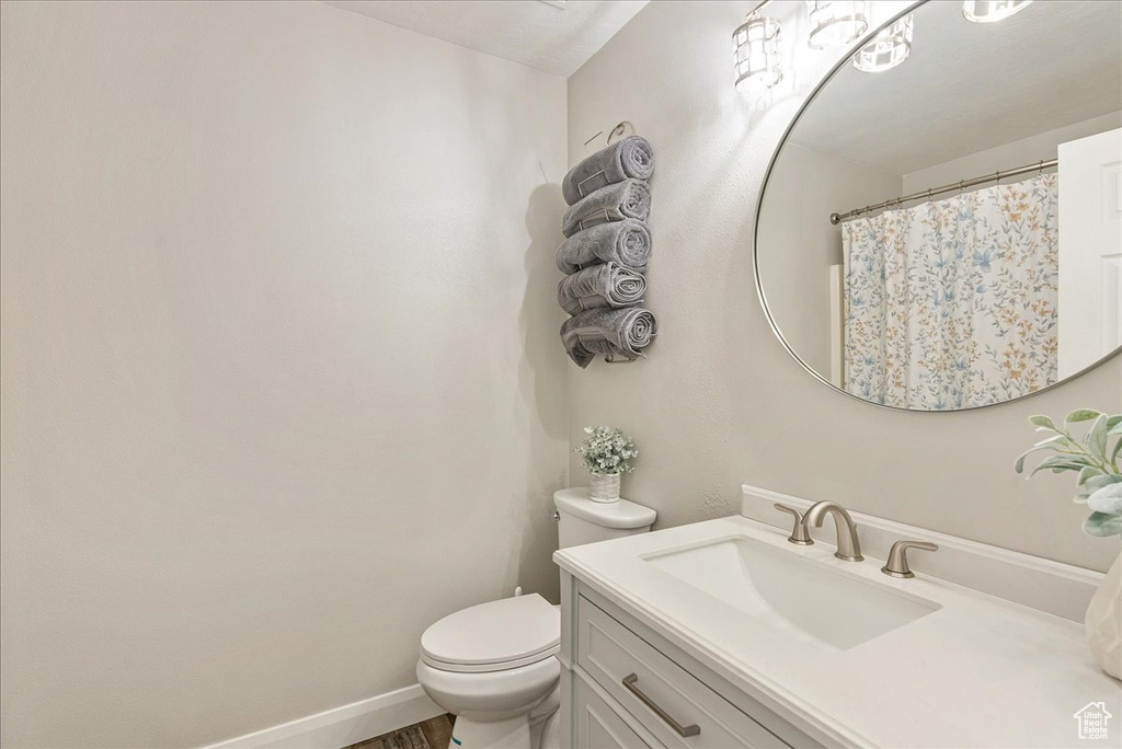 Bathroom with toilet and vanity