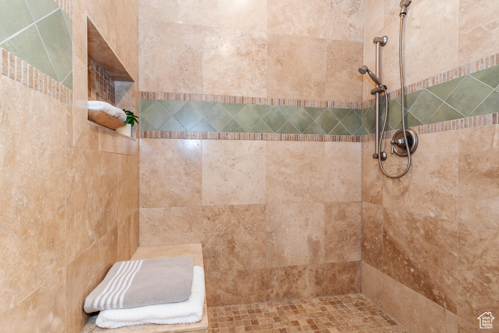 Bathroom with a tile shower