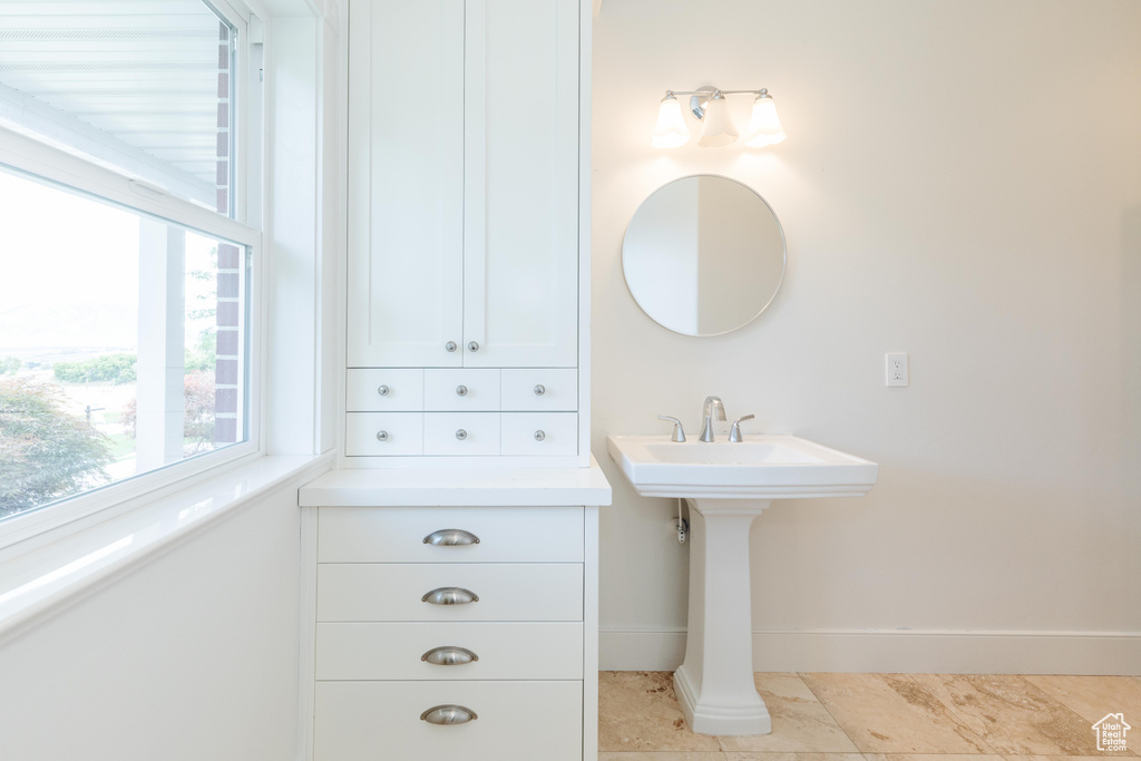 Bathroom with tile patterned floors