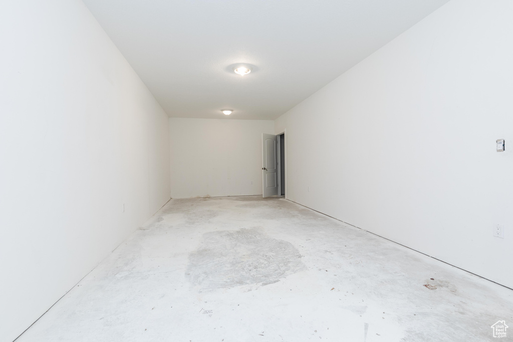 Unfurnished room featuring concrete floors