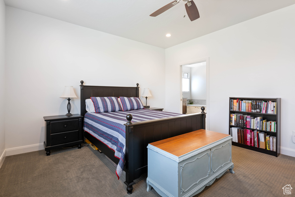 Carpeted bedroom with ceiling fan