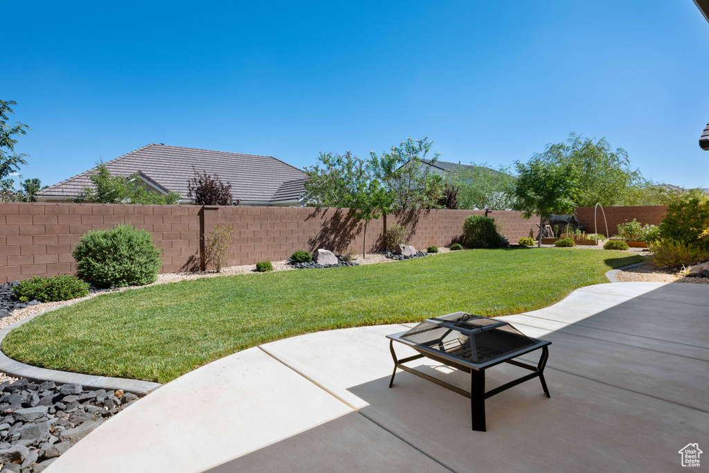 View of yard with a patio