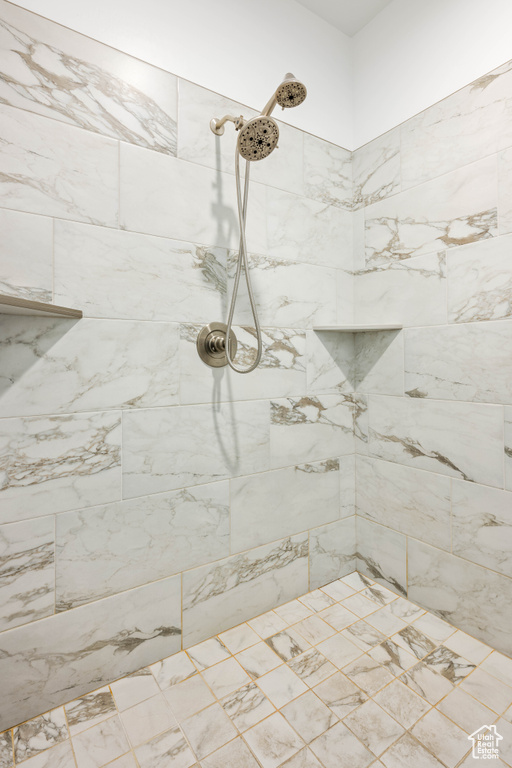 Bathroom with tiled shower