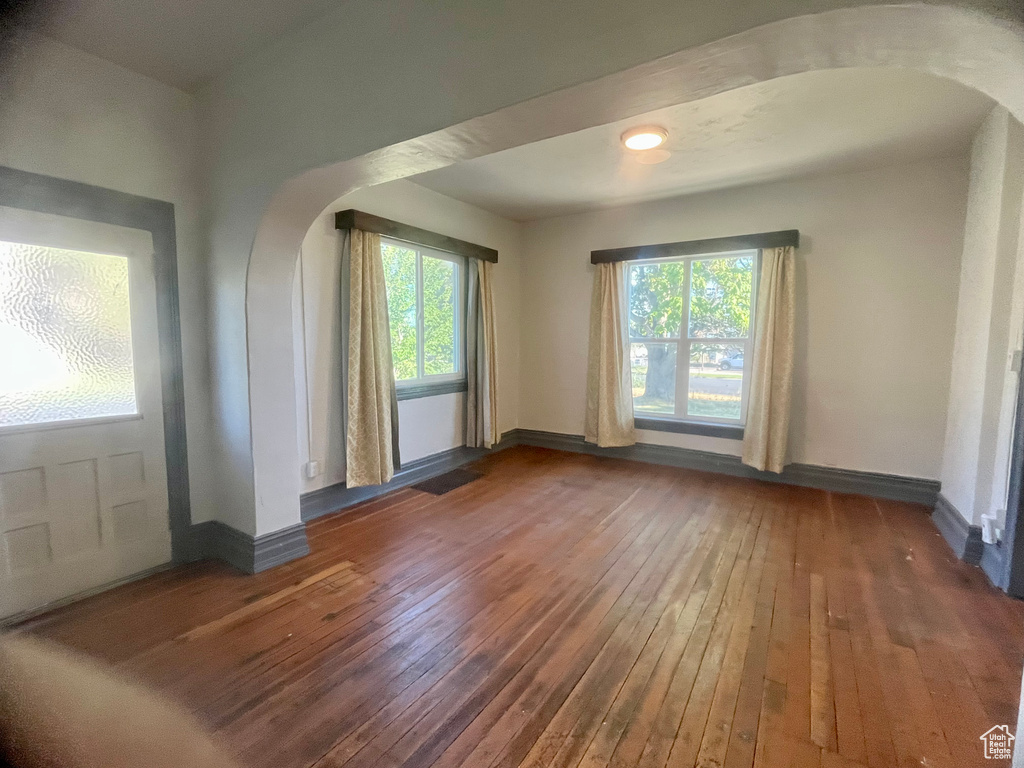 Interior space featuring dark hardwood / wood-style flooring