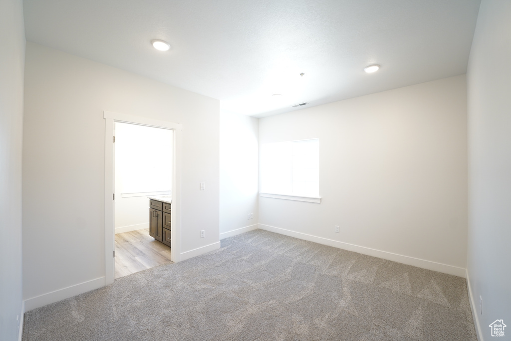 View of carpeted spare room