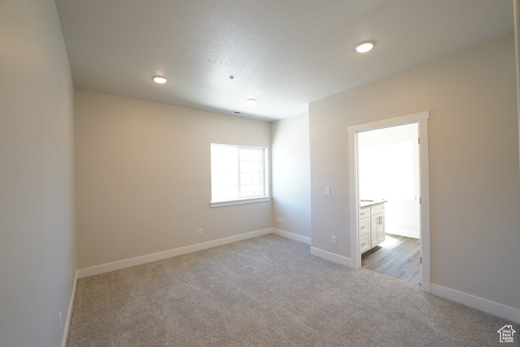 View of carpeted spare room