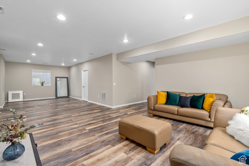 Living room featuring hardwood / wood-style flooring