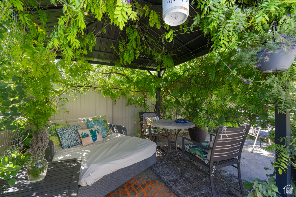 View of patio with an outdoor living space