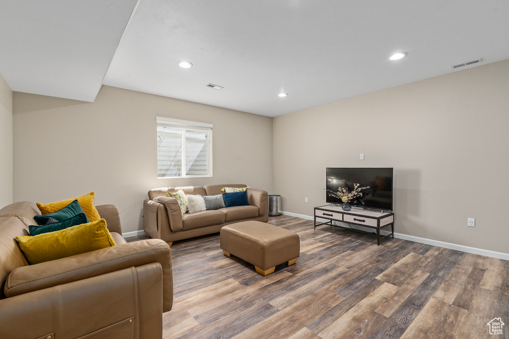 Living room featuring hardwood / wood-style flooring